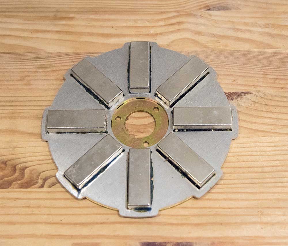 Leading edge turbine replacement magnet rotor