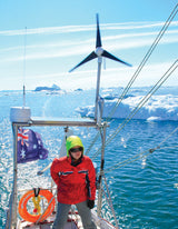 AIR turbine on boat on sea with icebergs